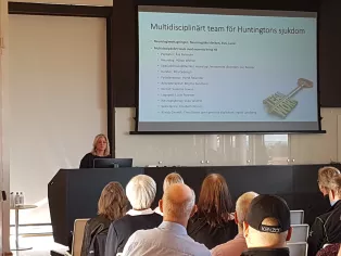 Photo of Åsa Petersén giving a talk on HD in May 2019.